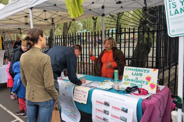 Alexis Smallwood represents 596 Acres at the Hester Street Fair on Earth Day